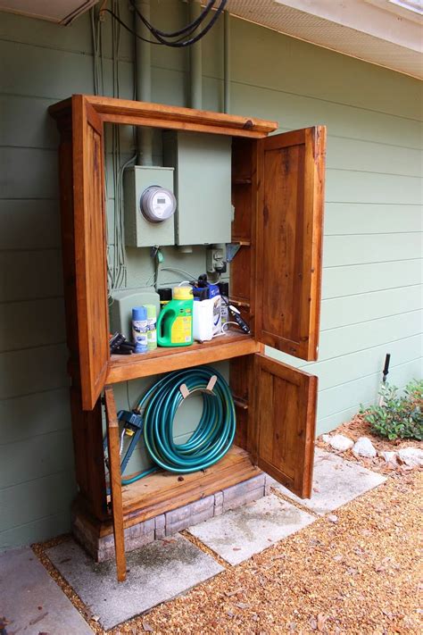 electrical box hiding ideas|hiding utility boxes in garden.